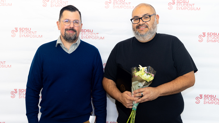 Geography Chair Fernando Bosco (left) with award winner Andrés Peñalosa Reyna.