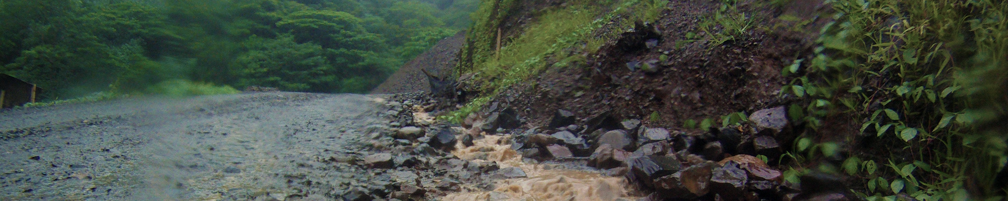 mountain road during rainstorm
