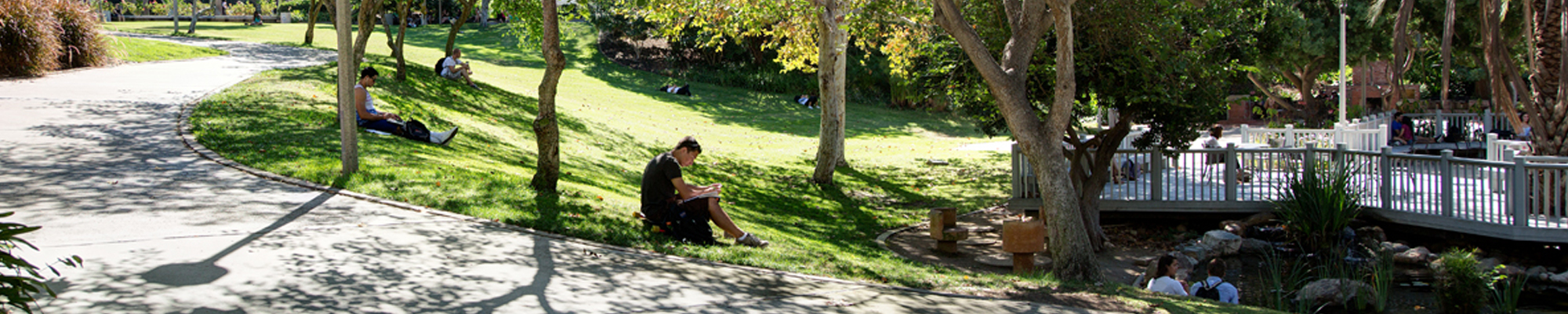 students studying on lawn near Scripps Cottage